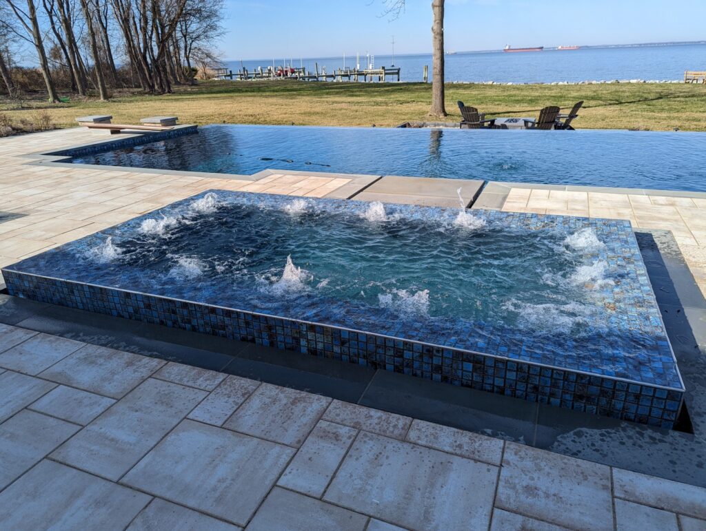 infinity edge pool with detached spa