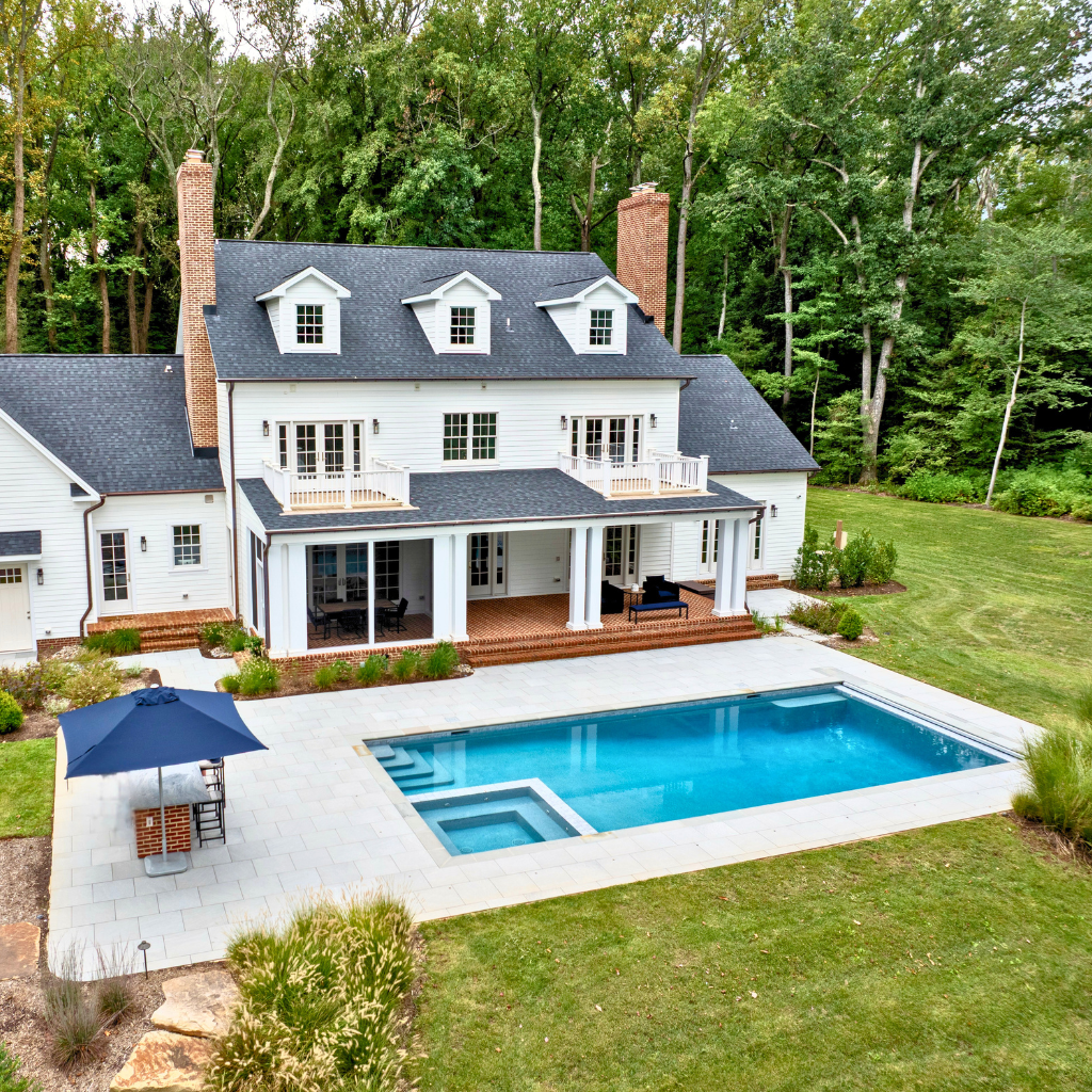 custom freeform pool and spa with outdoor kitchen
